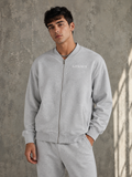 ESSENTIAL ZIP-UP FLEECED VARSITY JACKET